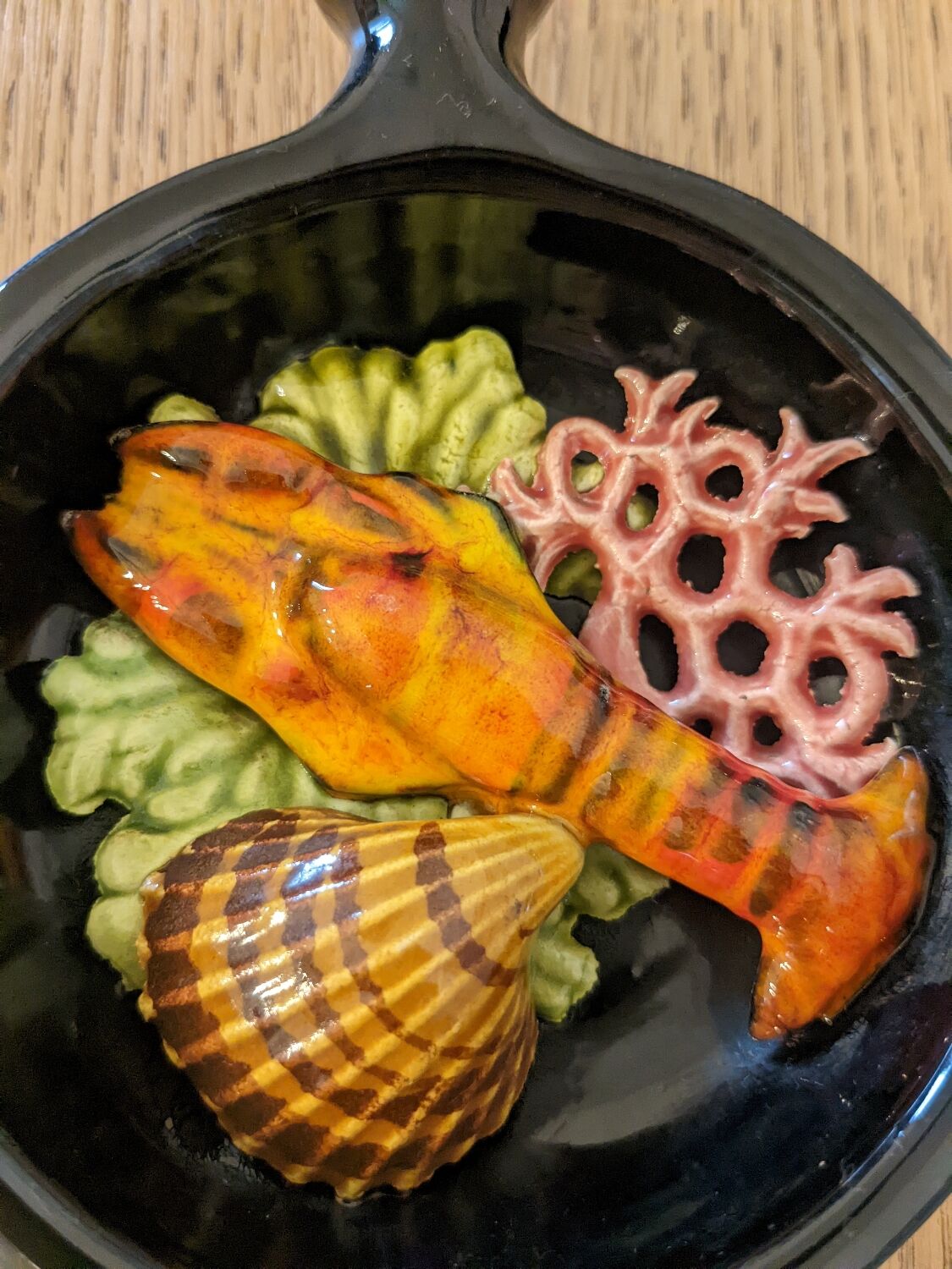 Two trompe l'oeil ceramic casseroles