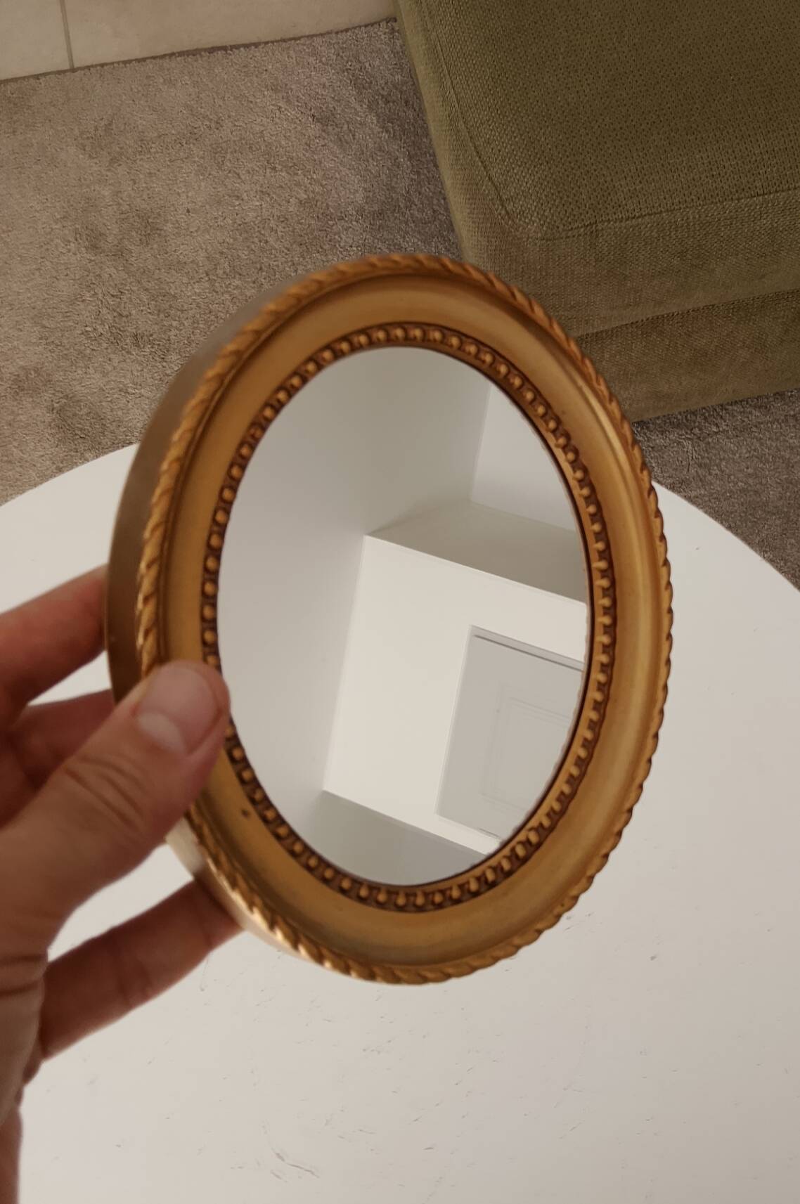Small vintage oval mirror in gilded resin from the 60s/70s.