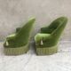Paire de fauteuils crapaud vert
