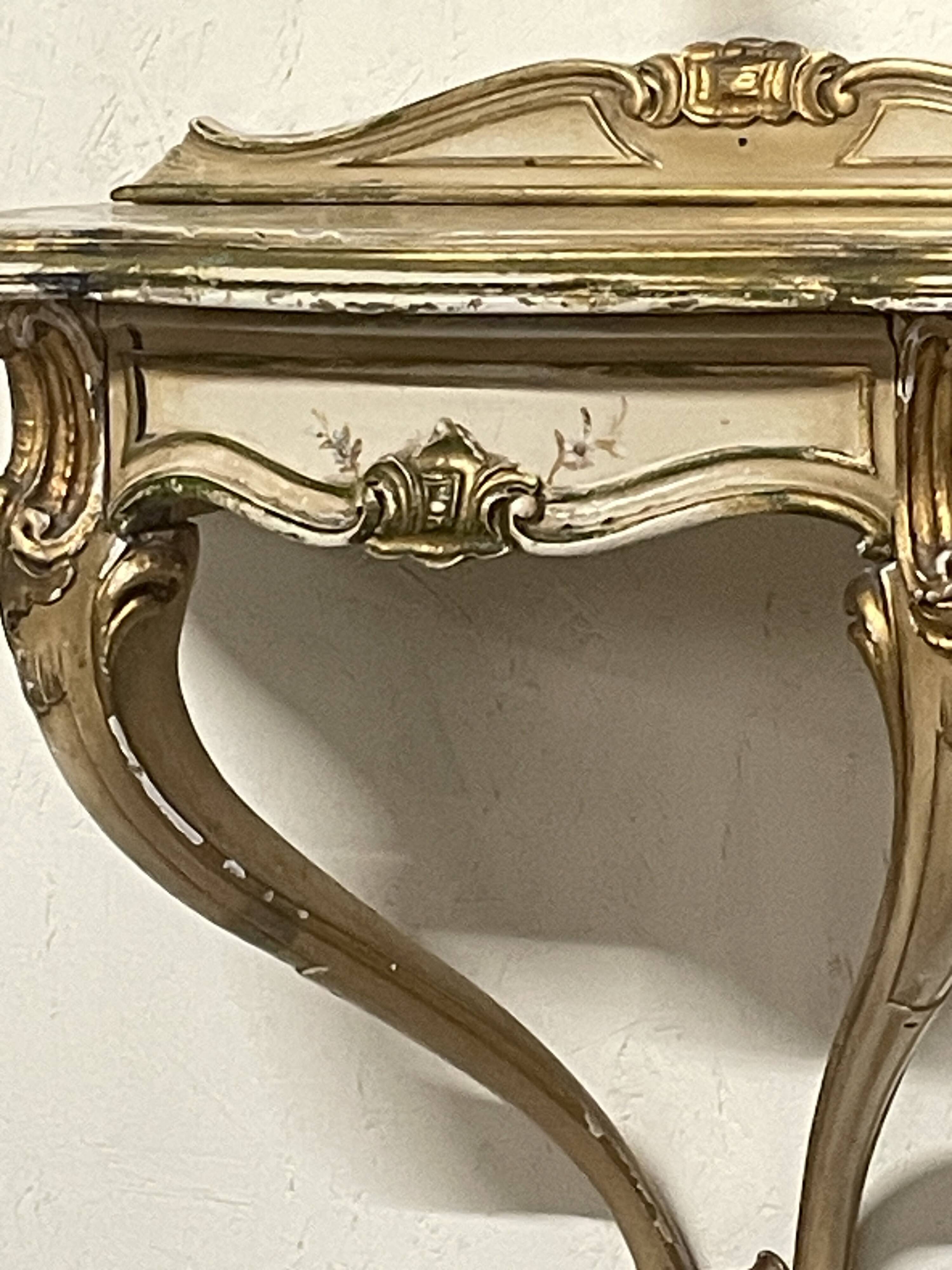 Pair of wall-mounted consoles with a mirror in Louis XV style.