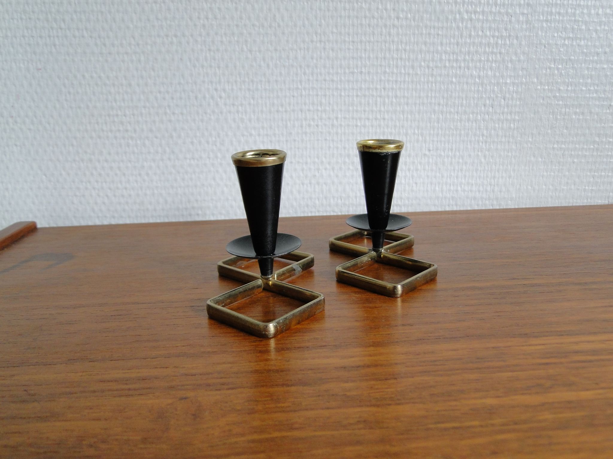 Pair of vintage candle holders in black metal and brass Sweden 1960