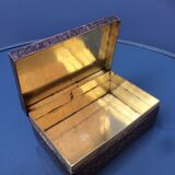 Old box in chiseled and carved brass