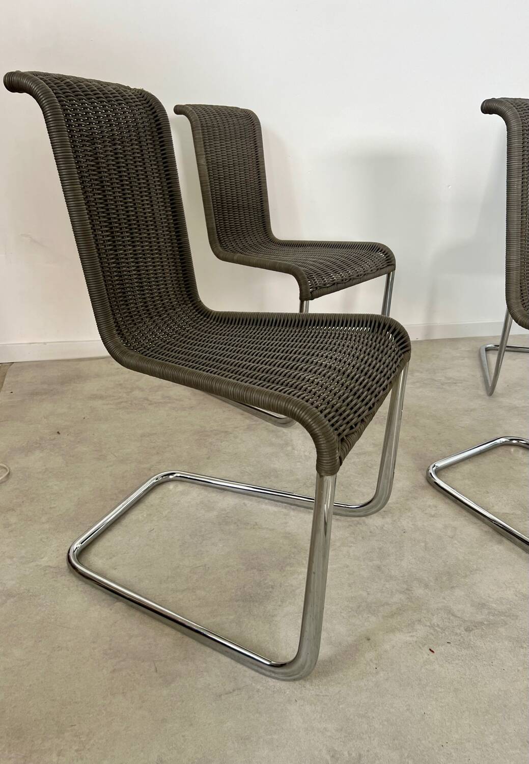 Set of 8 Tecta designer tubular chairs, Bauhaus style, metal and vintage gray cane, 80s