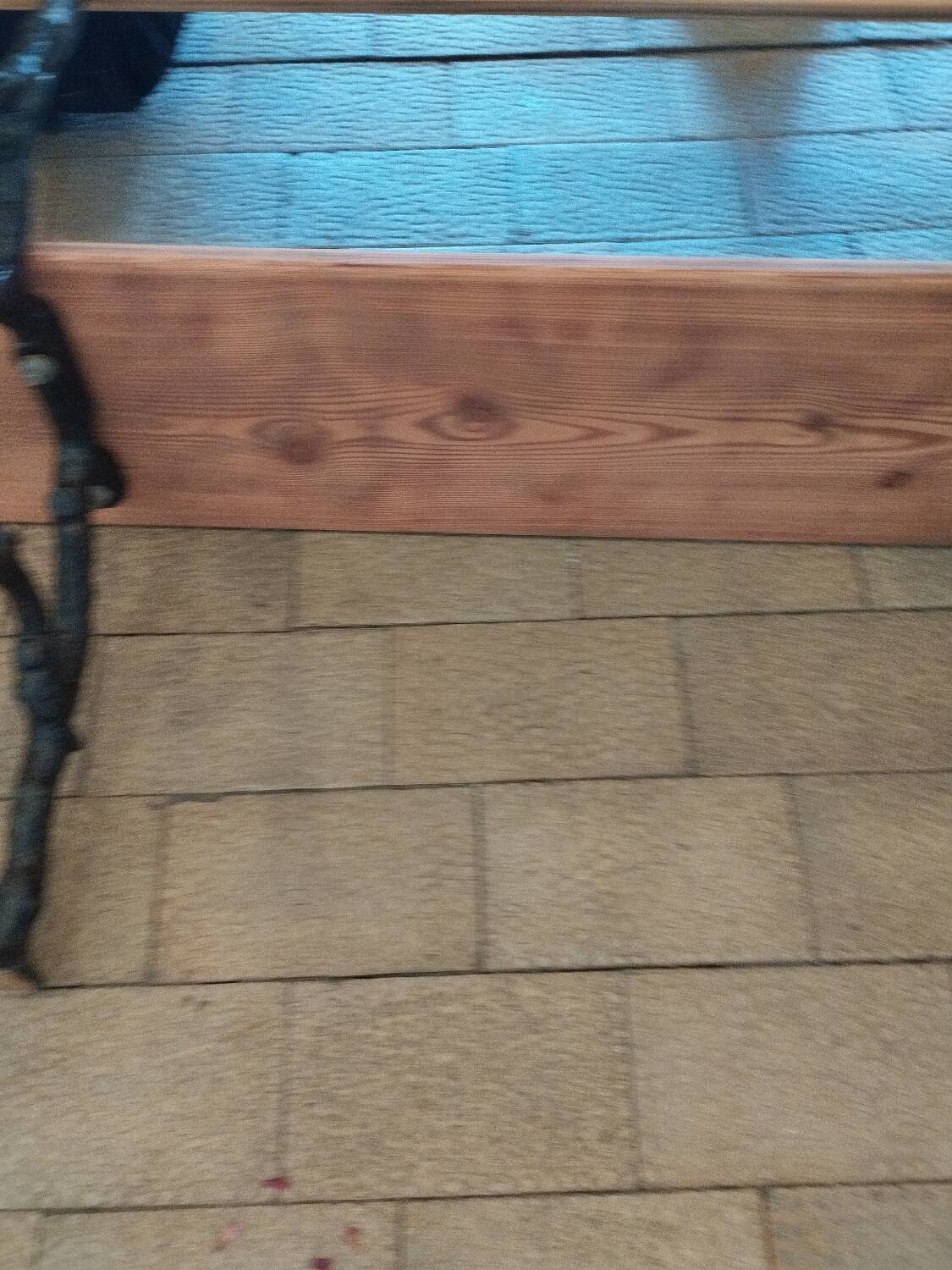 Antique garden bench with cast iron legs