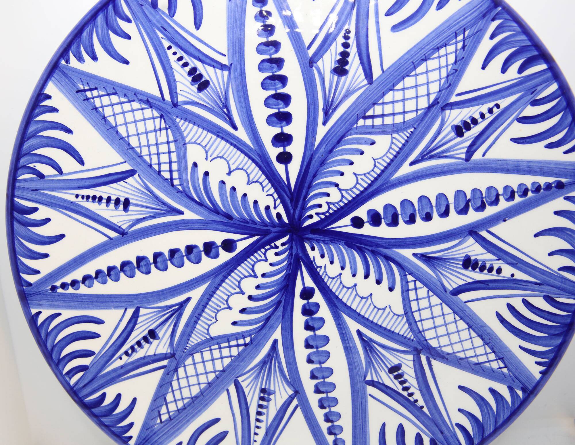 Xl dish from Spain with hand-painted blue rosette