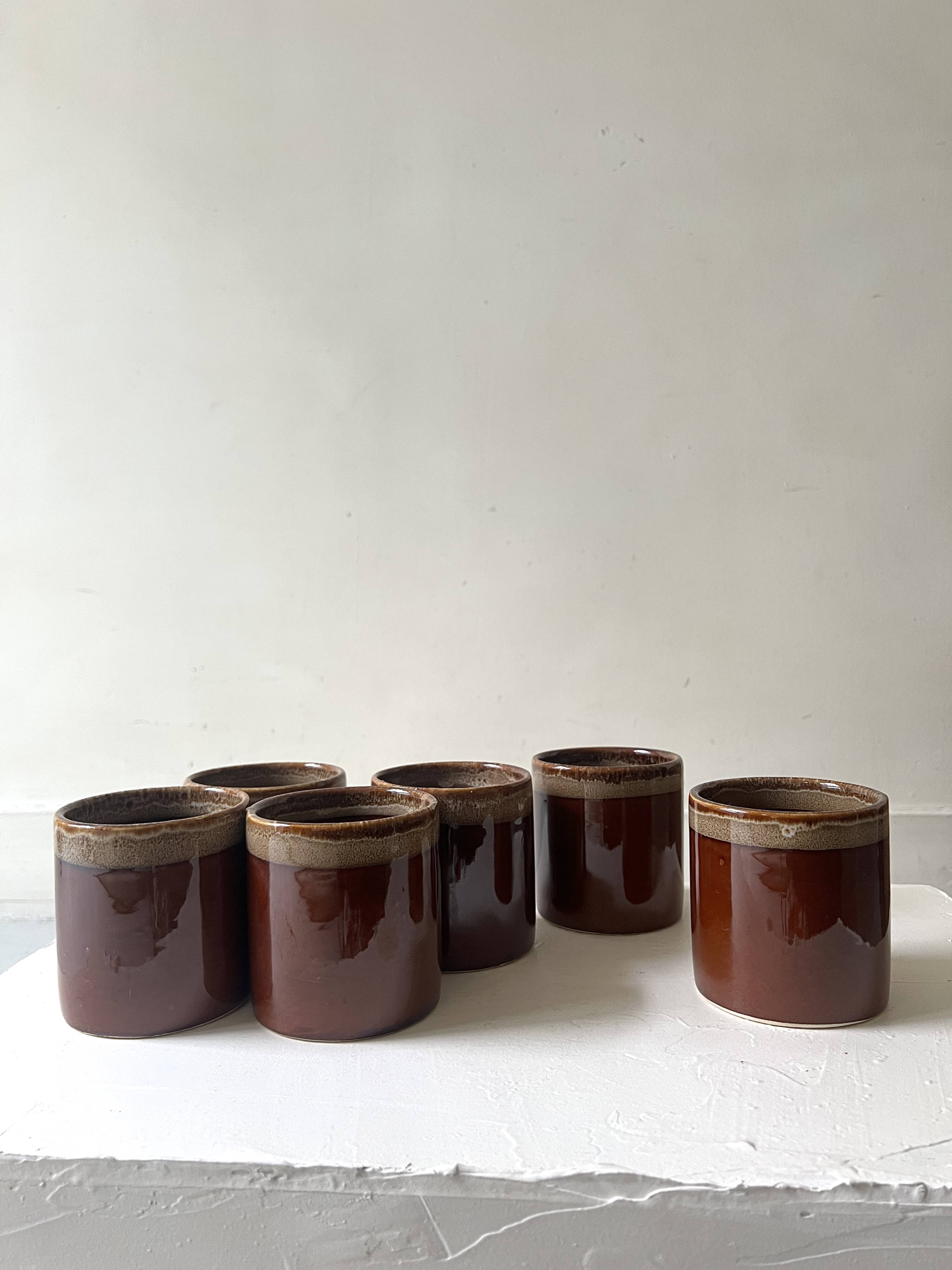 Service of 6 coffee cups in handcrafted glazed ceramic, amber brown, 1970.