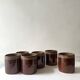 Service of 6 coffee cups in handcrafted glazed ceramic, amber brown, 1970.