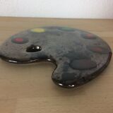 Under flat painter palette, ceramics
