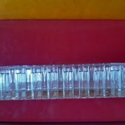 Service platter for aperitifs with four compartments in cut glass.