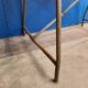 Vintage workbench circa 1930, folding metal leg.