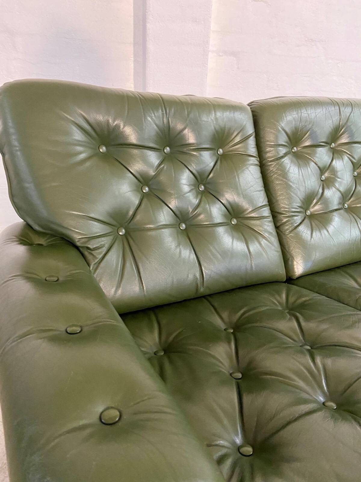 Vintage retro Danish 2 person olive green buttoned leather sofa 1970s