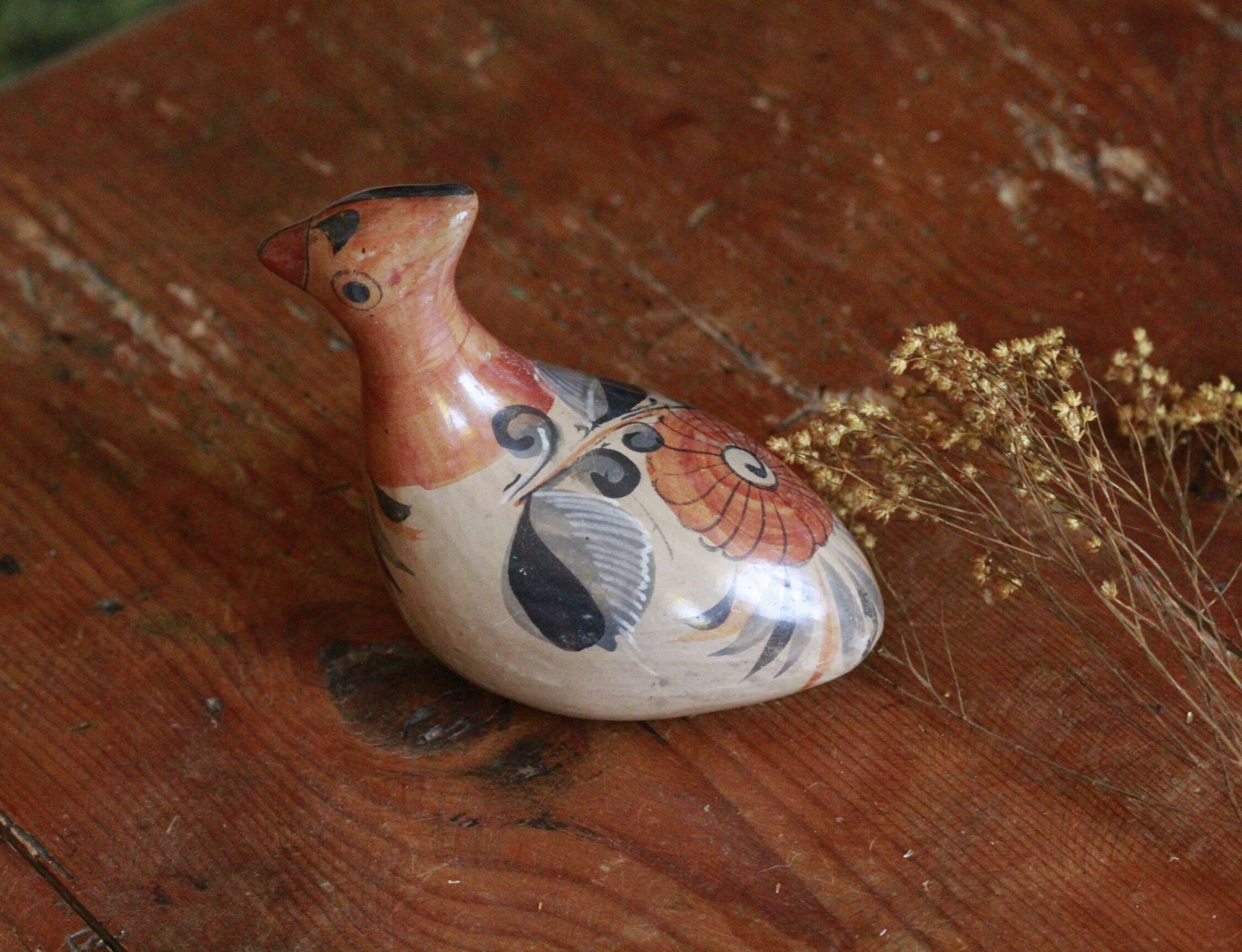 Ancient Mexican bird statue in ceramic