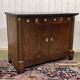 Empire buffet from the early 19th century in mahogany with a black marble top.