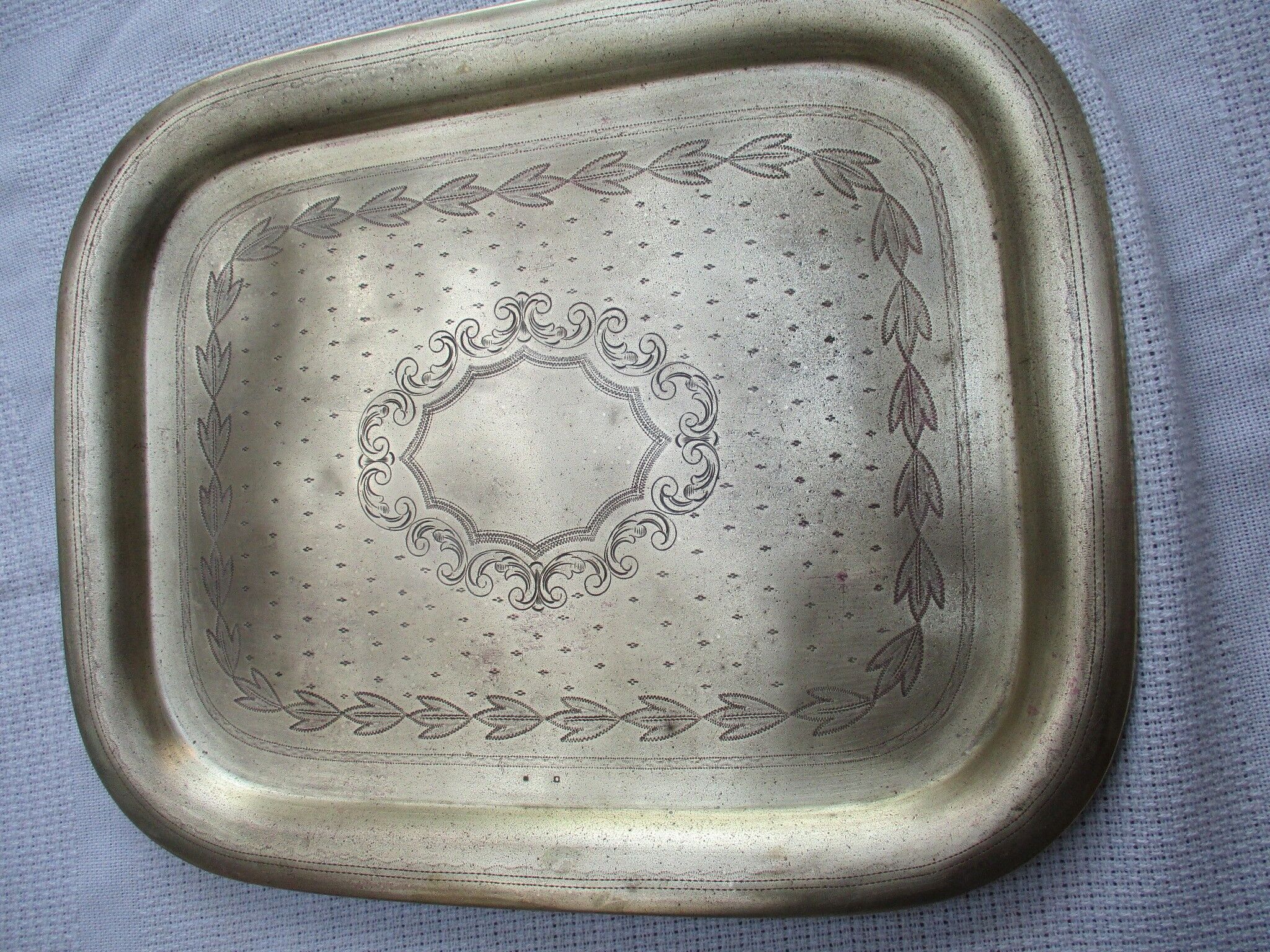 Rectangular brass top with engraved decoration