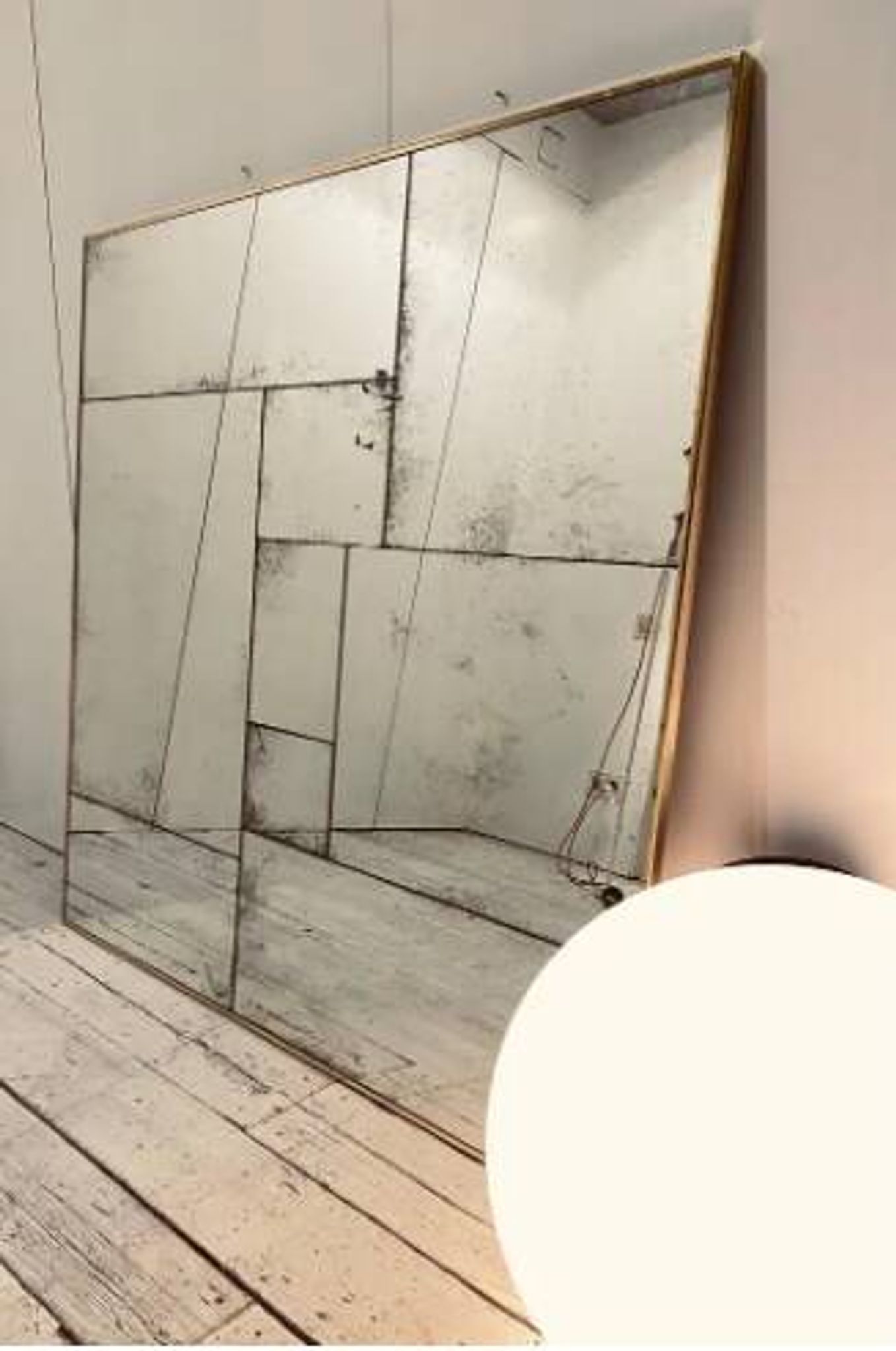 Handcrafted industrial mirror made to measure with a hand-aged frame and brass finish.