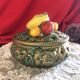 Openwork earthenware candy box with fruit slip