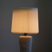 Modern vintage French table lamp, made of stone with fish patterns, 1970s.