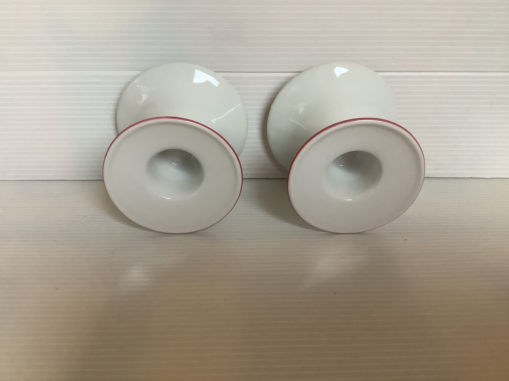 Pair of white candlesticks, pink line, Germany
