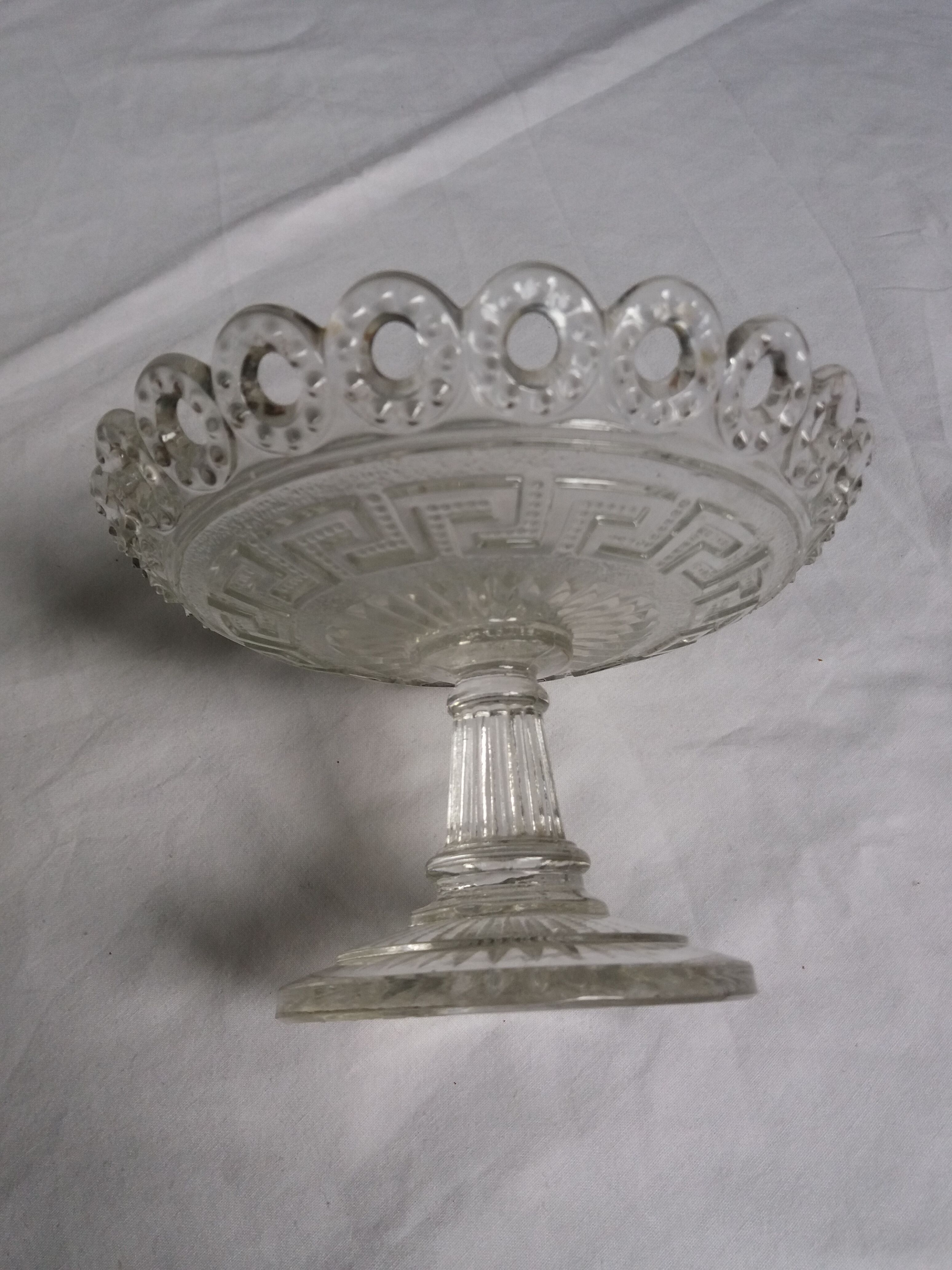 Cup on foot openwork chiseled glass