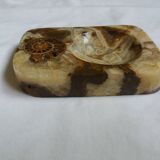 Marble pocket ashtray with fossil ammonite