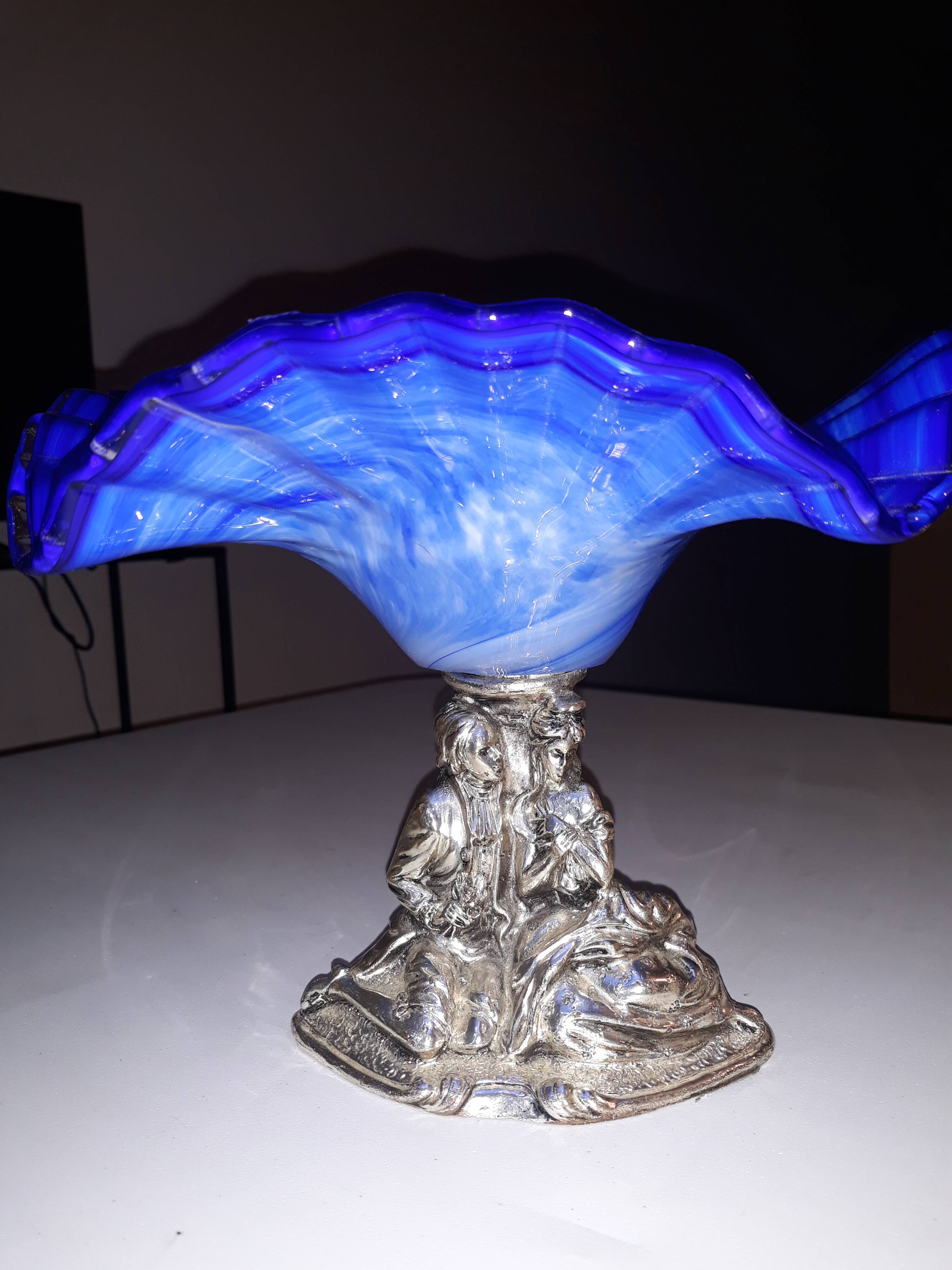 Glass and metal fruit bowl