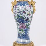 Pair of porcelain lamps decorated with bronze satyrs. Circa 1880.