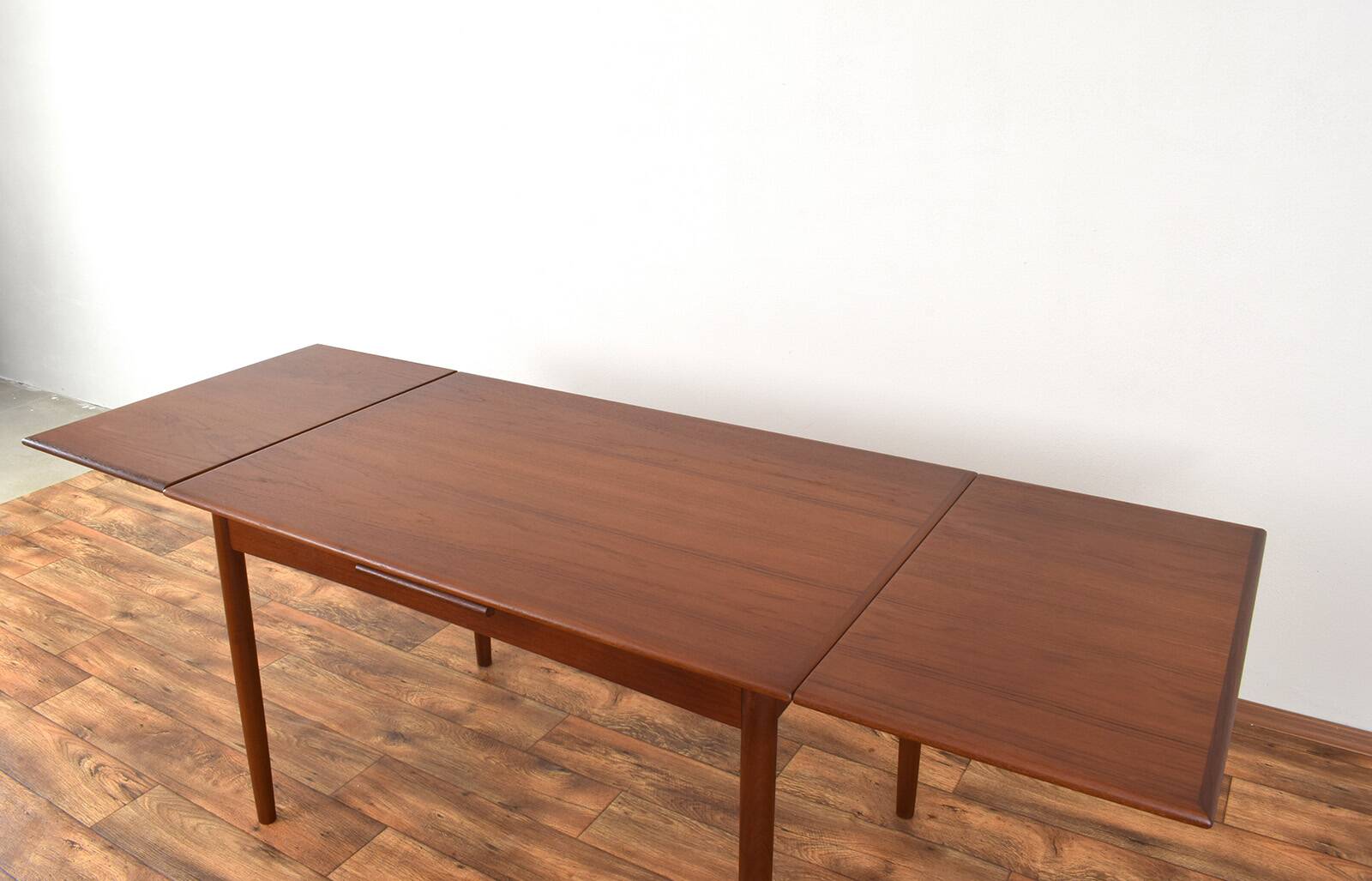 Mid-century Danish teak extendable dining table, 1960s.