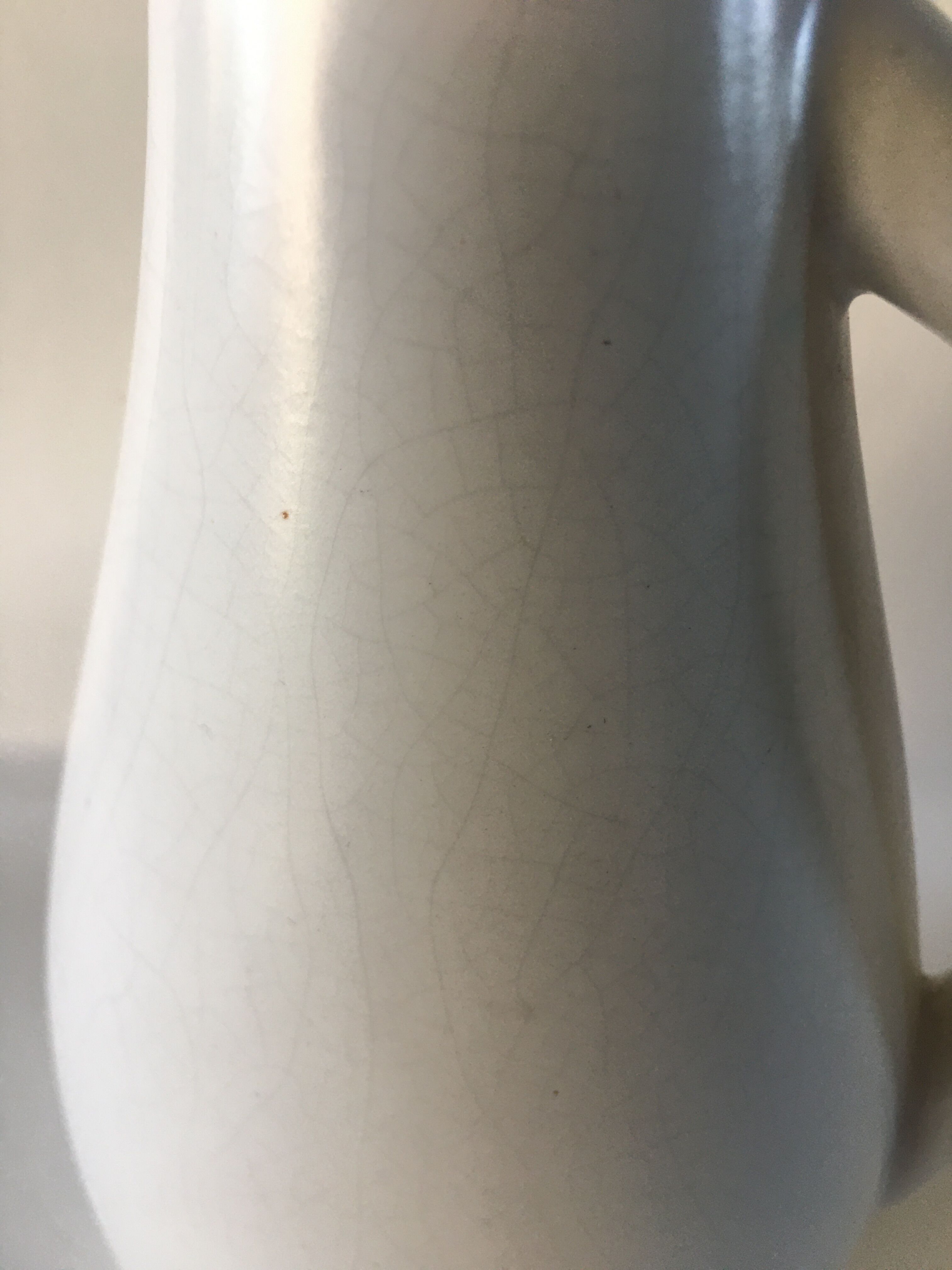 Cracked ceramic pitcher