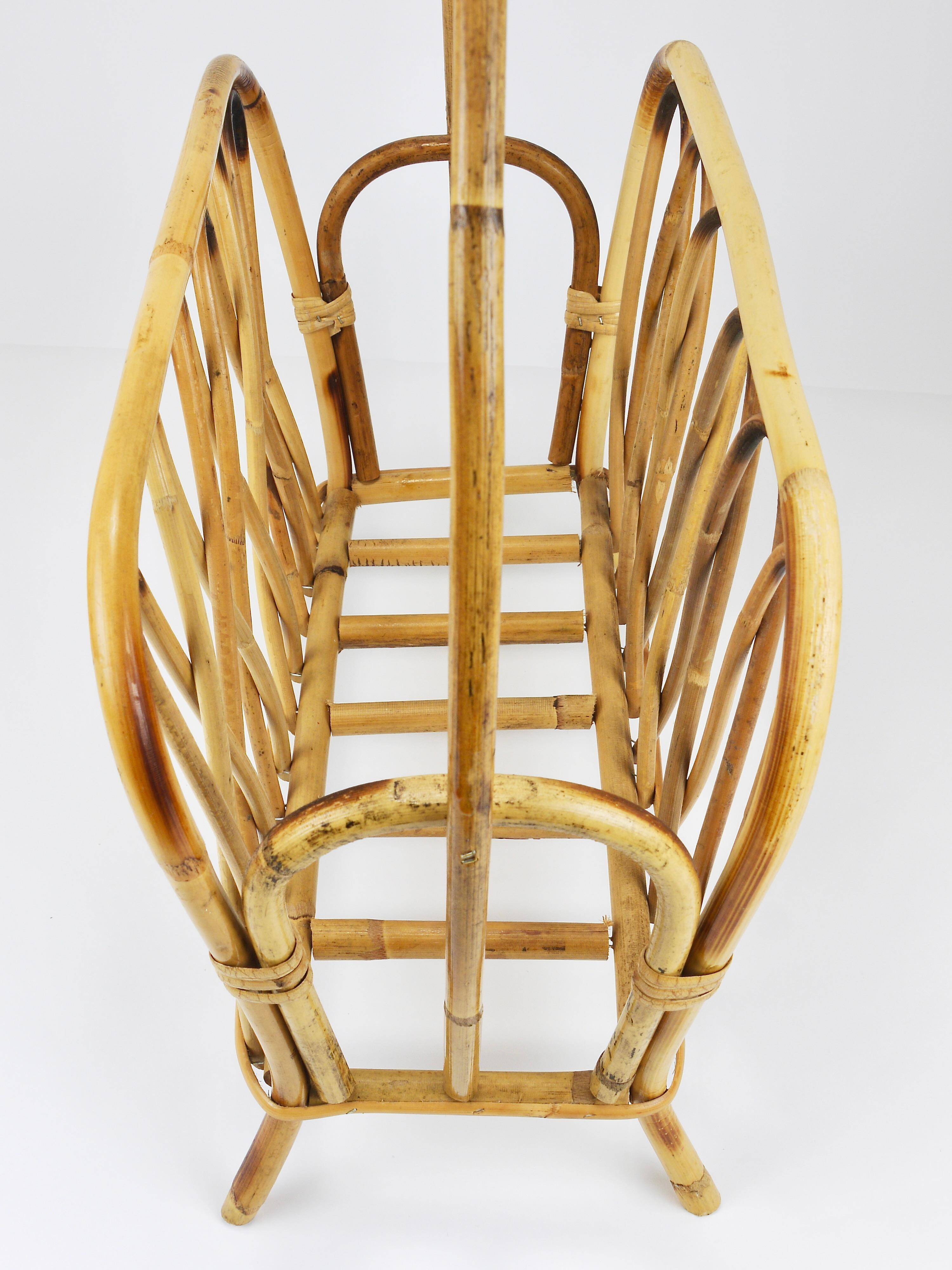 Bamboo and rattan magazine rack in the style of Franco Albini, Italy, 1970s.