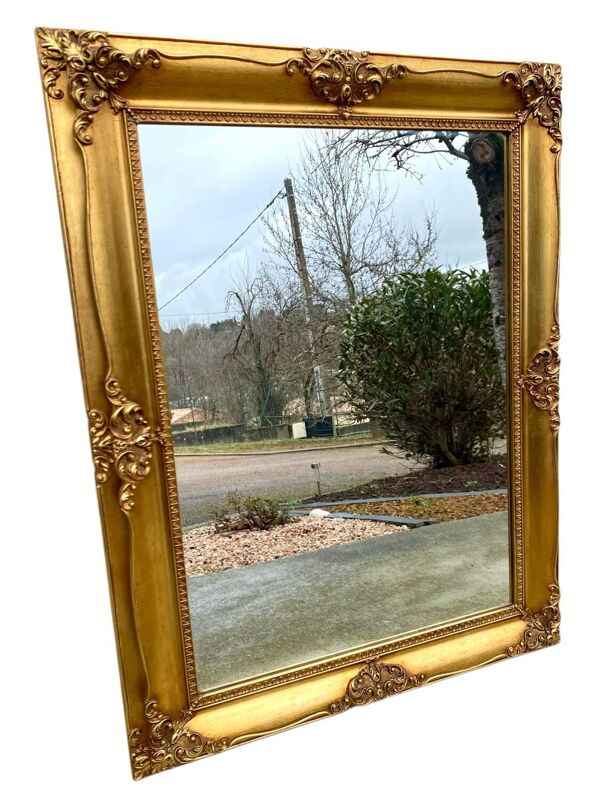 Miroir biseauté en bois doré