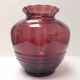 Beautiful Doyen Art Deco vase in burgundy glass.