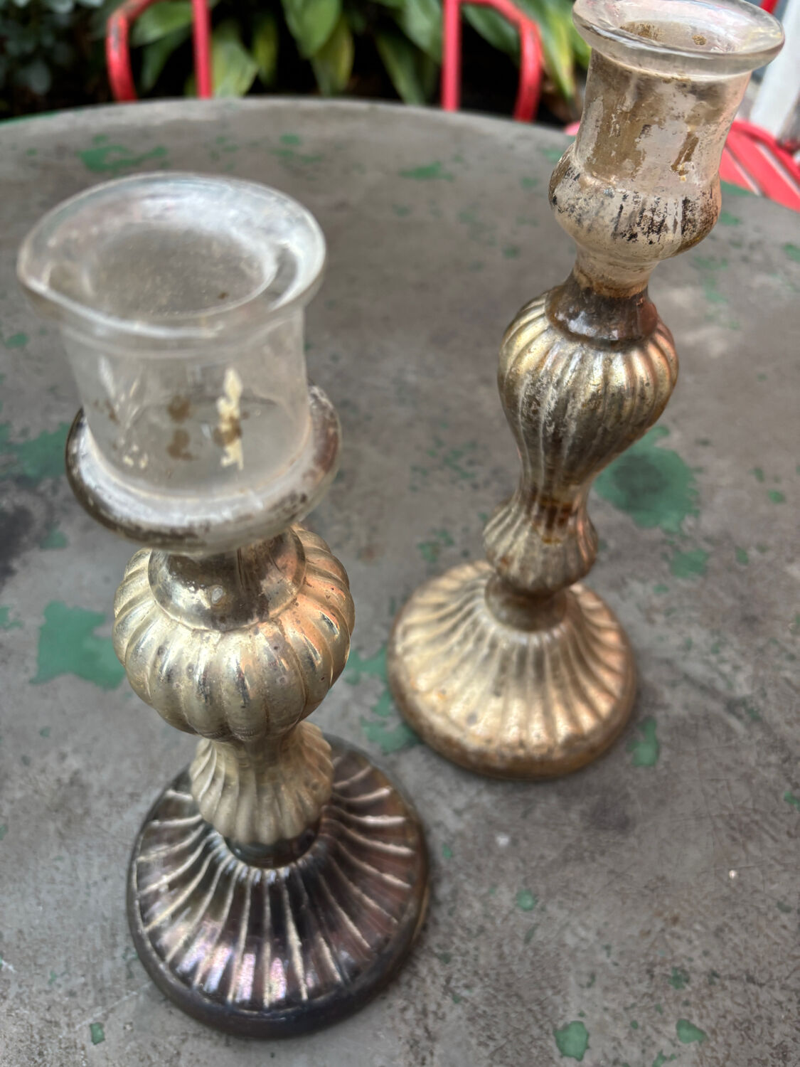 Pair of eglomisé candlesticks