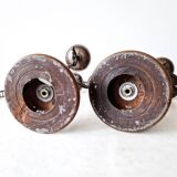 Pair of antique wooden and brass candlesticks