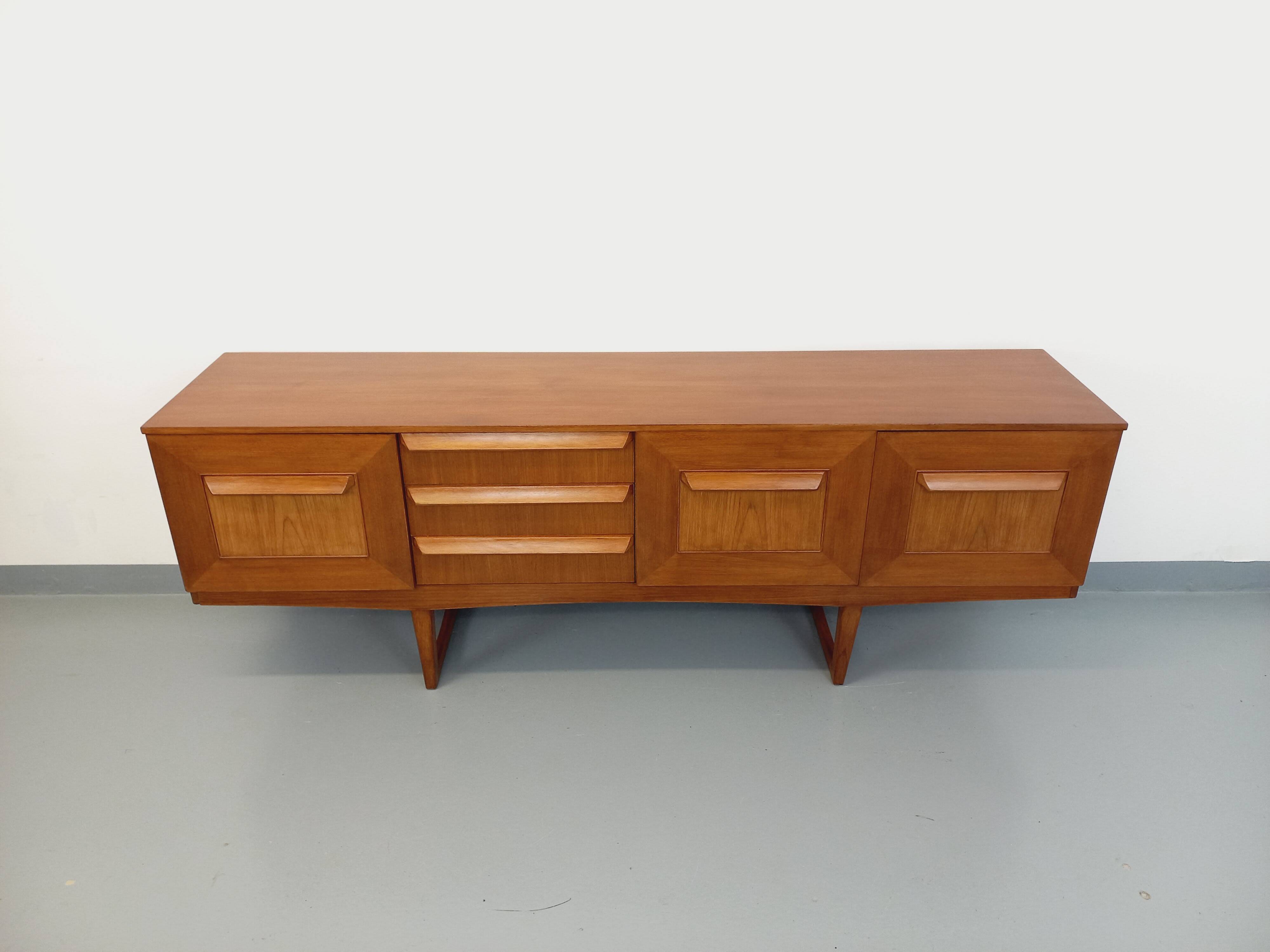 Vintage Scandinavian style sled foot sideboard in teak from the 60s