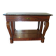 Empire/Restoration style console table with scrolled ends, mirrored back, and claw feet.