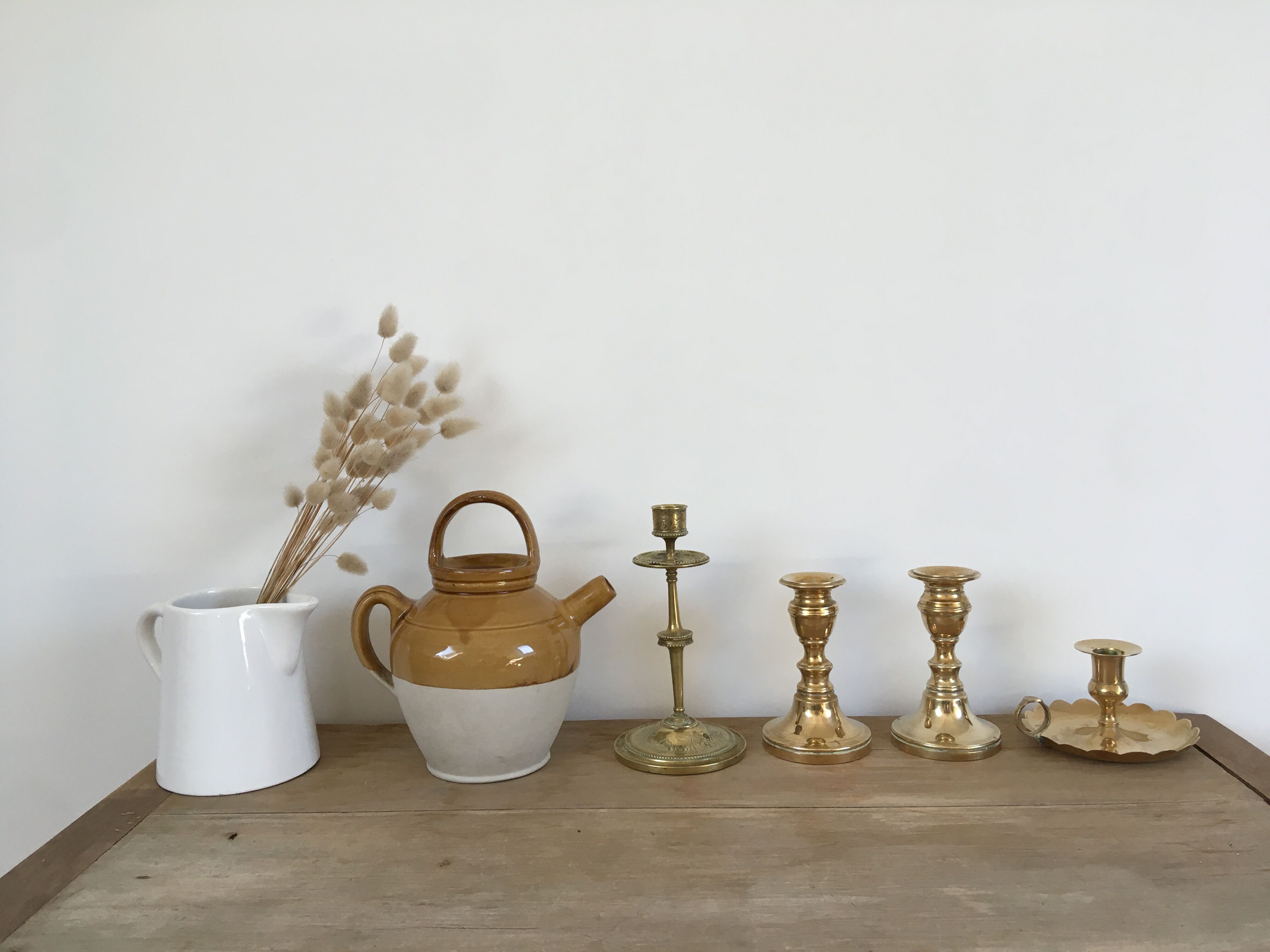 Chiseled brass candle holder