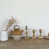 Chiseled brass candle holder