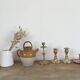 Chiseled brass candle holder