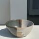 White and glossy brown two-tone ceramic bowl, matt earth