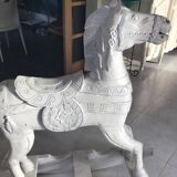 Cheval de bois à bascule