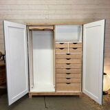 Wardrobe with two wardrobe compartments and drawers