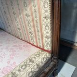 Antique Louis XVI style daybed in carved wood and patterned fabric