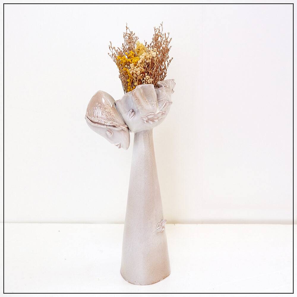 Ceramic sculpture of a female face - flower vase decoration