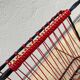Scoubidou and wrought iron magazine rack