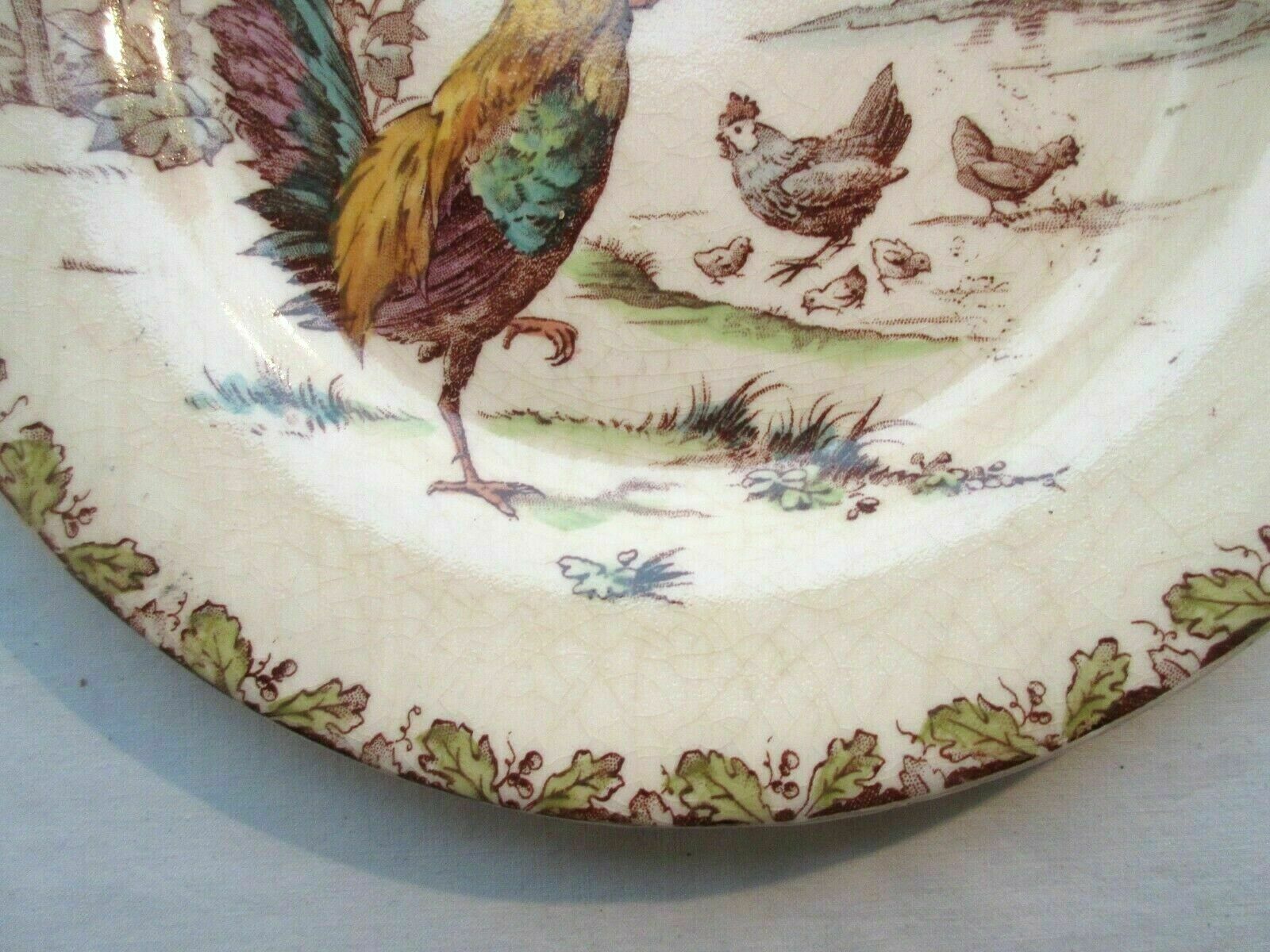 Polychrome plate Iron Earth signed Gien model Coqs