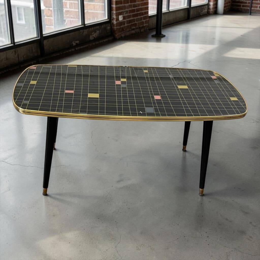 Table basse vintage en formica noir et or