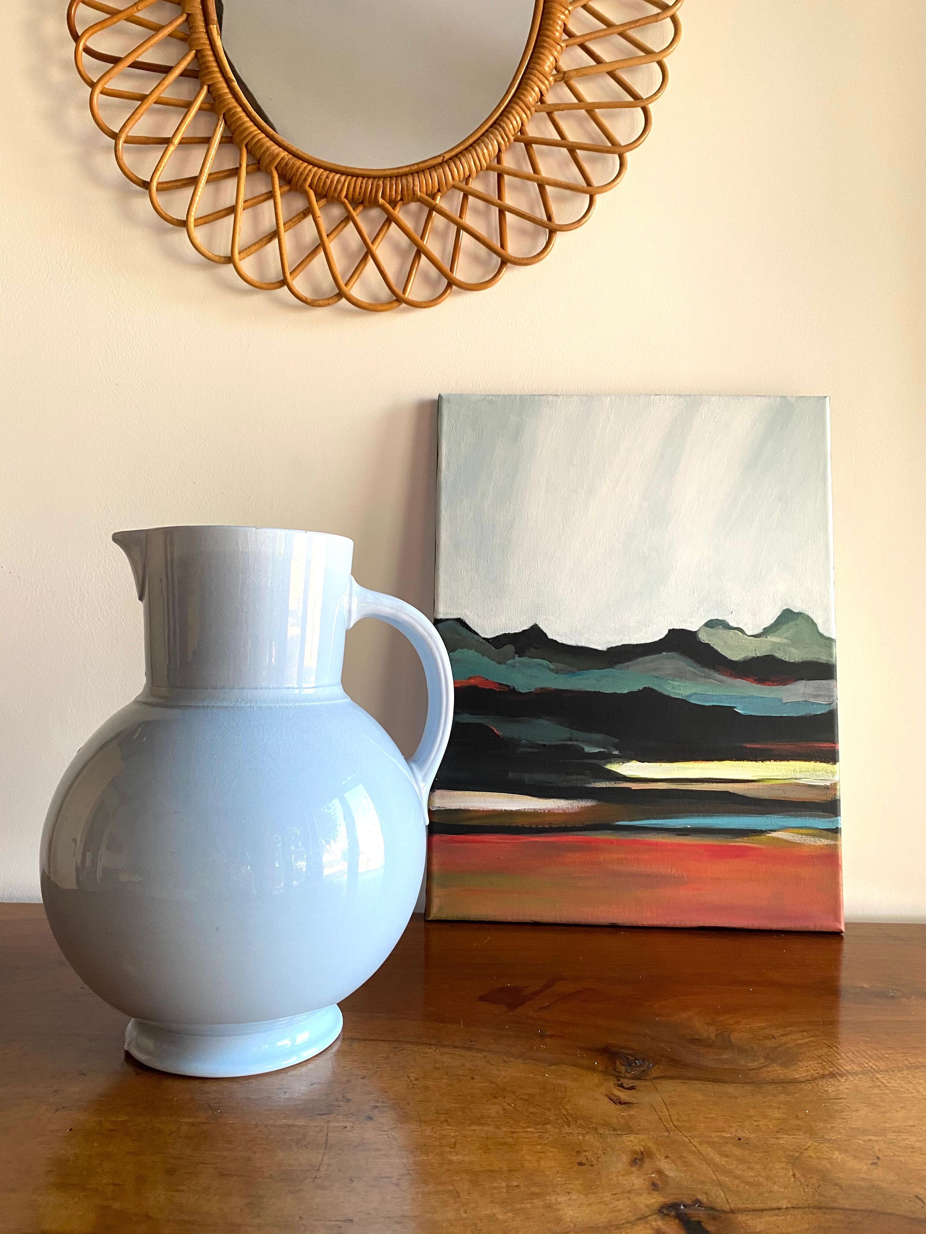 Antique vase in pale blue ceramic