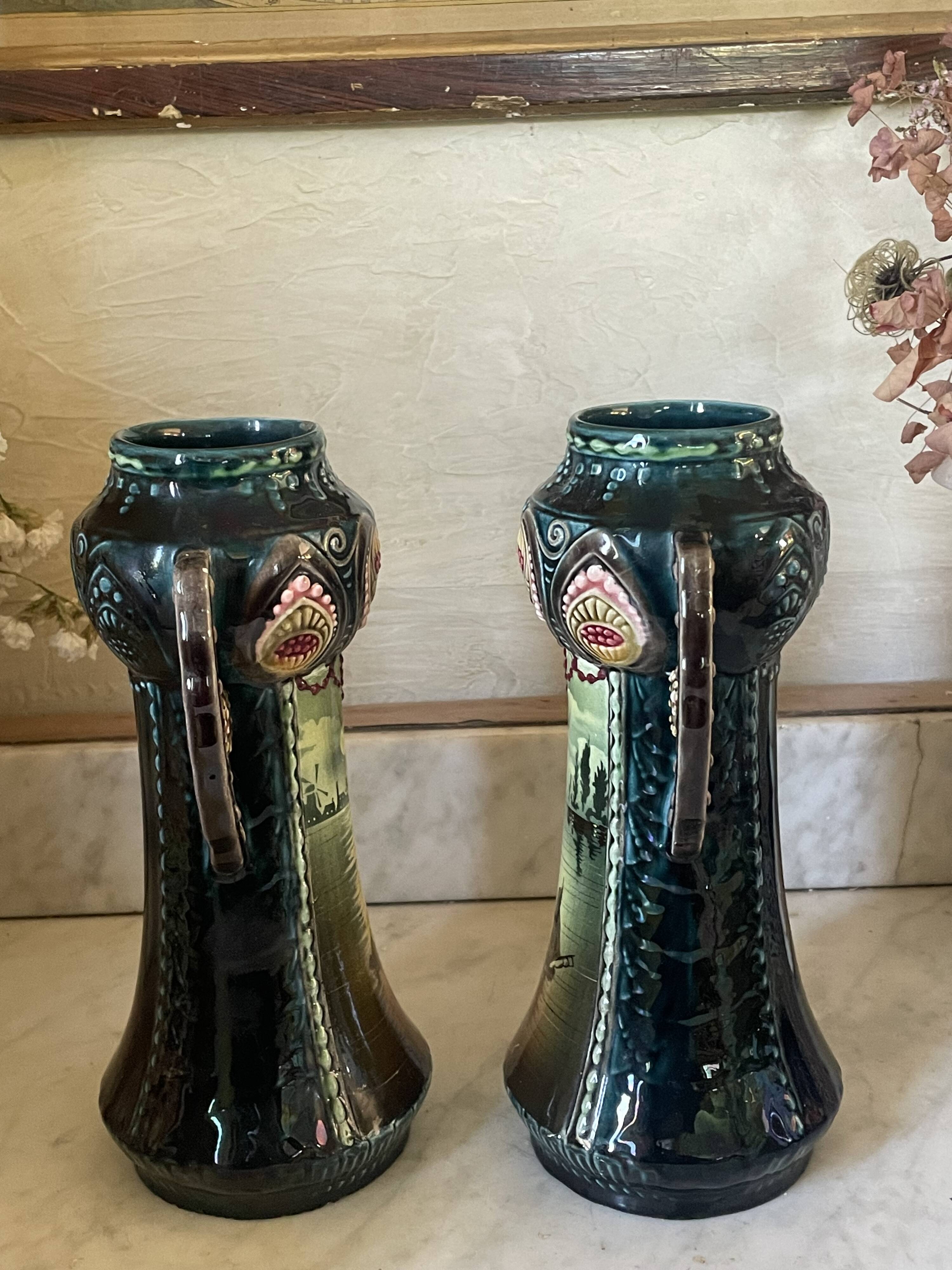 Pair of Art Nouveau slipware vases, hand-painted decoration.