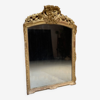 Mirror with golden ornaments