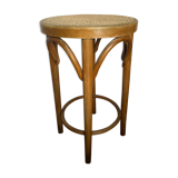 Curved wooden stool and cannage